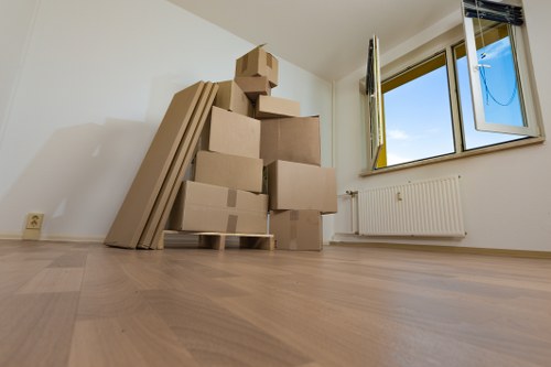 Organised storage unit in Twickenham with boxes and furniture