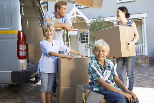 Twickenham resident organizing belongings for mobile self storage
