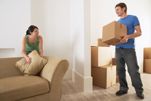 House removals team handling furniture in Twickenham